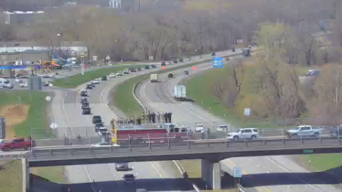 Officer Jensen's funeral procession on the way to the funeral home in Rome